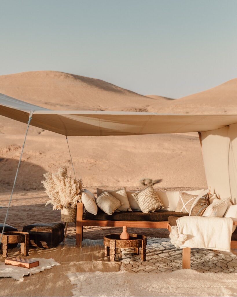 towering cliffs, Agafay Desert, Marrakech, Scenic view of golden sand dunes and barren landscape in Agafay Desert, Morocco.